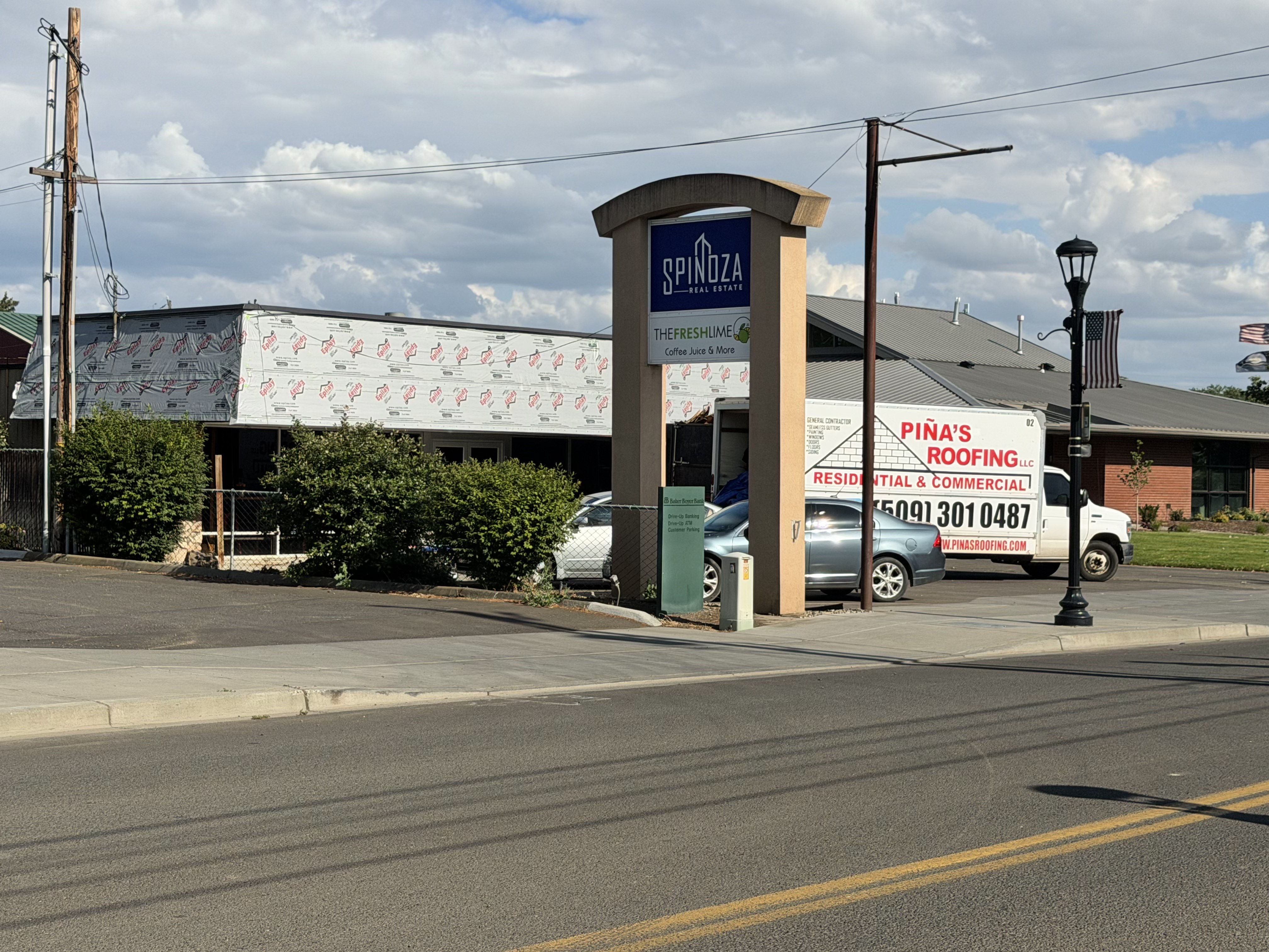 Piña's Roofing on site at a commercial office in Walla Walla