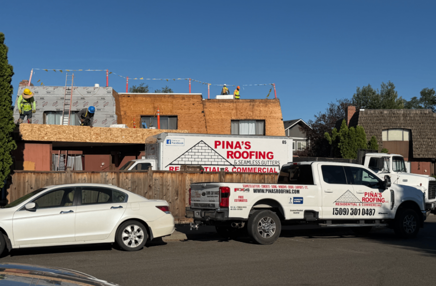 Mid-project view of the multi-family roofing installation
