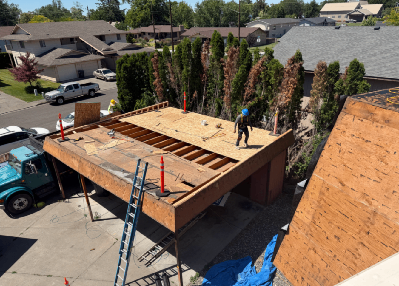 Aerial view of decking replacement in progress on the multi-family project